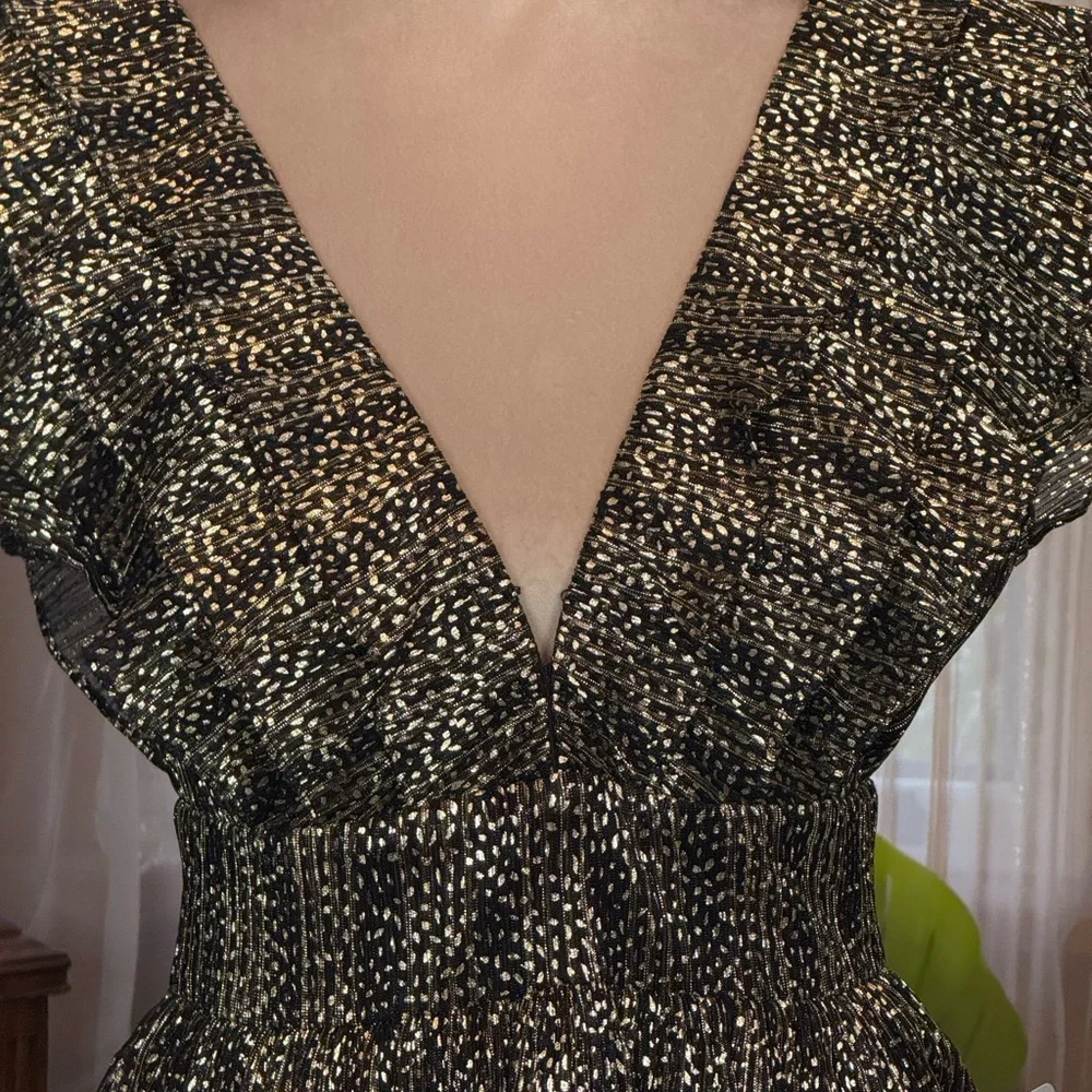 Socialite Mini Dot Ruffled Babydoll Dress in Black and Gold